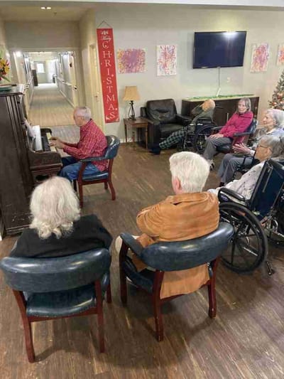 Residents enjoying music in a common area