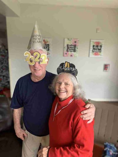 Residents celebrating New Year's with festive hats