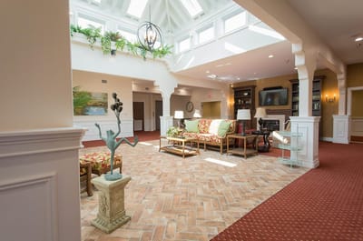 Bright common area with seating and decor