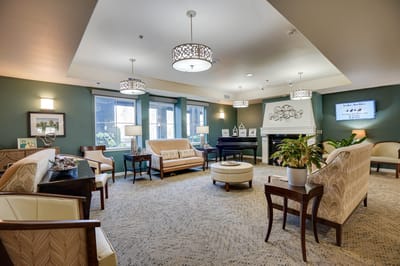Cozy common area with seating and piano