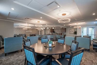 Interior common area with seating and dining table