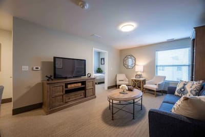 Bright interior of a resident living space with furniture