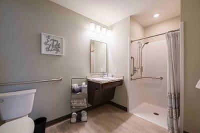 Private bathroom with shower and modern fixtures