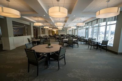 Dining area with tables and overhead lighting