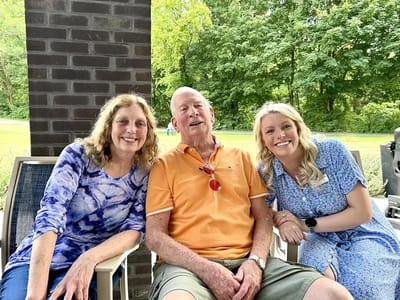 Residents and staff enjoying time outdoors together
