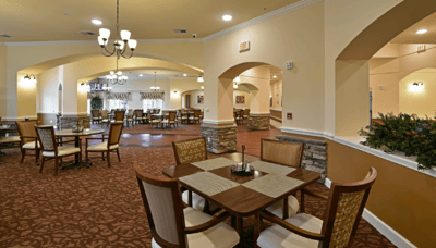 Bright common area with tables and chairs