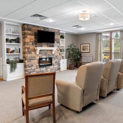 Cozy common area with comfortable seating and a fireplace