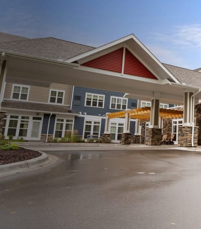 Exterior view of Harrison Bay Senior Living's entrance
