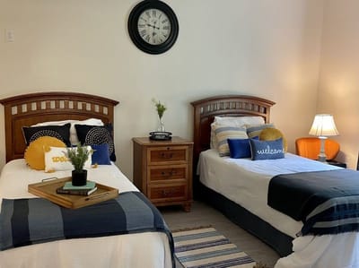 Cozy shared resident bedroom with two beds