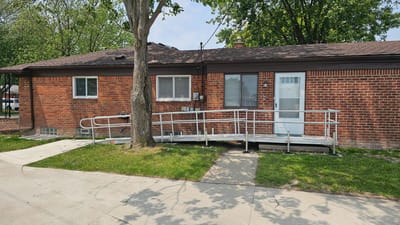 Exterior view of a building with accessibility ramp