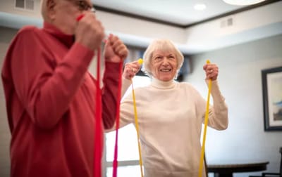 Residents participating in a stretching exercise session