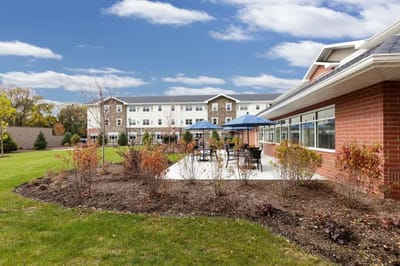 Outdoor patio area with seating and building view