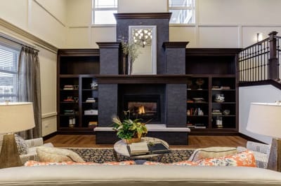 Cozy common area with seating and a fireplace