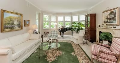 Cozy common area with a piano and comfortable seating