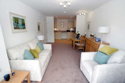 Bright and inviting living area with furniture