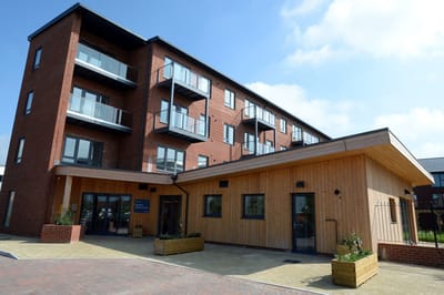 Exterior view of Edward Jenner Court facility building