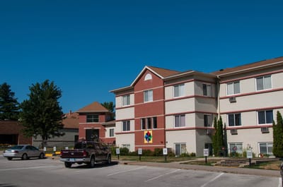 Exterior view of Elm Crest Retirement Community building