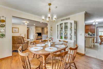Bright dining area with wooden table and chairs