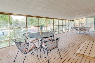 Outdoor seating area with tables and chairs
