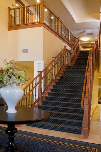 Interior view of a staircase in a senior living facility