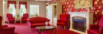 Interior of a cozy lounge area with red decor