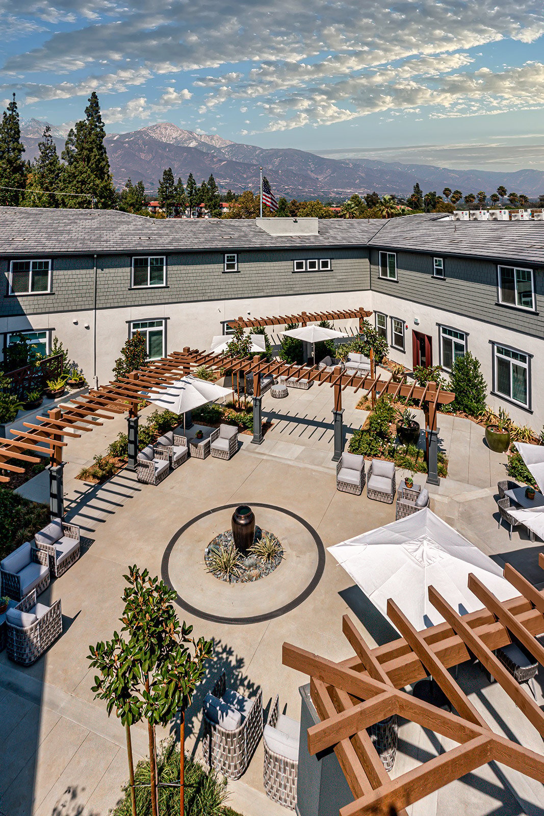 Beautiful outdoor courtyard with seating and pergolas