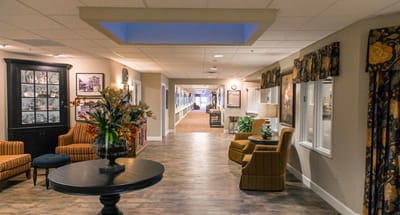 Bright interior corridor with seating and decorations