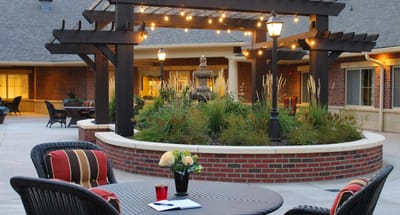 Outdoor courtyard with seating and landscaping