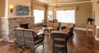 Comfortable lobby area with seating and decorative lighting