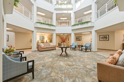 Bright common area with seating and decor