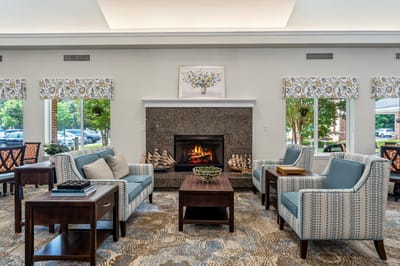 Cozy common area with a fireplace and seating