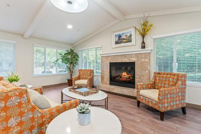 Cozy common area with a fireplace and seating