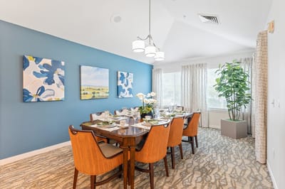 Elegant dining room setup with floral decor