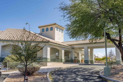 Exterior view of a senior living facility from the entrance
