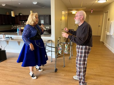 Residents engaging in a group activity in a common area