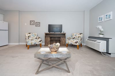 Cozy interior of a resident room with seating area
