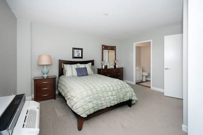 Cozy private resident room with a large bed