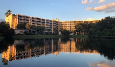 Exterior view of Sun Towers Retirement Community by the water