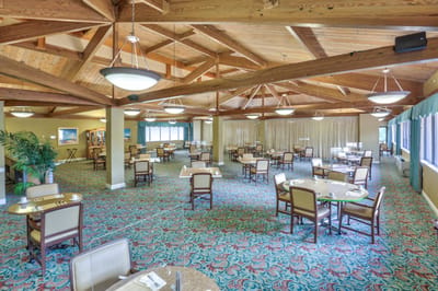 Dining room with tables and wooden beams