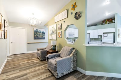Common area with seating and decorative walls