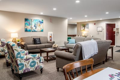 Bright common area with comfortable seating and decor