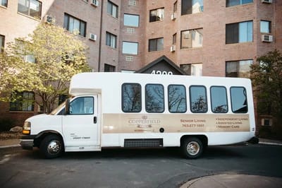 Facility transport van parked outside Copperfield Hill