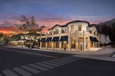 Exterior view of The Kensington Sierra Madre building at sunset