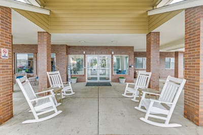 Outdoor sitting area with rocking chairs