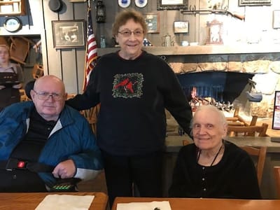 Residents enjoying time together in a cozy dining area