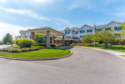 Exterior view of the assisted living facility with landscaping