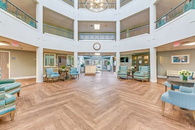 Interior view of a spacious common area with seating