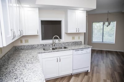 Bright kitchen area with modern appliances