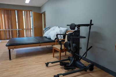 Interior room with medical equipment and a treatment table