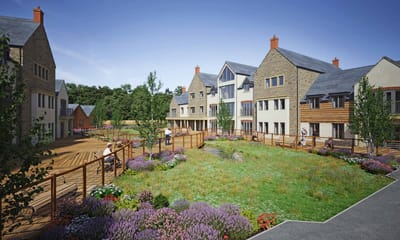 Residents enjoying a garden area with walking paths